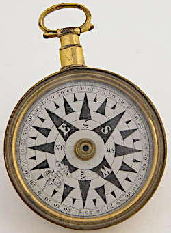 A pocket magnetic compass in a brass case, 1792